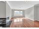 Spacious dining room featuring hardwood floors and a fireplace at 363 Clayton Dr, Charleston, SC 29414