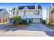 Two-story house with front porch, attached garage, and landscaped yard at 363 Clayton Dr, Charleston, SC 29414