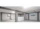 Workshop area in garage with shelving, workbench, and mini-fridge at 363 Clayton Dr, Charleston, SC 29414