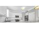 Modern kitchen featuring white cabinets, stainless steel appliances & marble countertops at 363 Clayton Dr, Charleston, SC 29414