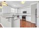 Modern kitchen with white cabinets, stainless steel appliances, and a breakfast bar at 363 Clayton Dr, Charleston, SC 29414