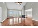 Spacious living room with hardwood floors, fireplace, and access to deck at 363 Clayton Dr, Charleston, SC 29414