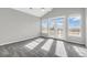 Main bedroom with carpet flooring, French doors to deck and water views at 363 Clayton Dr, Charleston, SC 29414