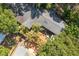 Overhead view of a home with a spacious deck and lush landscaping at 420 E Erie Ave, Folly Beach, SC 29439