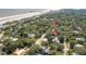 Aerial view showing home's location near the beach at 420 E Erie Ave, Folly Beach, SC 29439