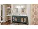Double vanity bathroom with dark green cabinets and white countertops at 420 E Erie Ave, Folly Beach, SC 29439