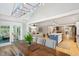 Open concept dining area with kitchen and living room views at 420 E Erie Ave, Folly Beach, SC 29439