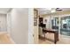 Home office with built-in shelving and access to patio at 420 E Erie Ave, Folly Beach, SC 29439