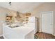 Clean and efficient kitchen with white cabinets at 420 E Erie Ave, Folly Beach, SC 29439