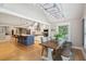 Open concept kitchen with island and stainless steel appliances at 420 E Erie Ave, Folly Beach, SC 29439