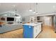Open floor plan with kitchen island and vaulted ceiling at 420 E Erie Ave, Folly Beach, SC 29439