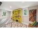 Bright laundry room features modern appliances, ample storage, and stylish geometric tile floor at 420 E Erie Ave, Folly Beach, SC 29439