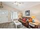 Cozy living room featuring a leather sofa and coffee table at 420 E Erie Ave, Folly Beach, SC 29439