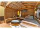 Relaxing outdoor hot tub area under a wooden pergola at 420 E Erie Ave, Folly Beach, SC 29439