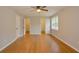 Spacious bedroom with hardwood floors and walk-in closets at 488 Society Rd, McClellanville, SC 29458