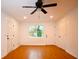 Bright bedroom with hardwood floors and ample closet space at 488 Society Rd, McClellanville, SC 29458