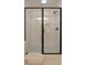 Modern shower with marble tile and frameless glass enclosure at 488 Society Rd, McClellanville, SC 29458