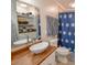 Bathroom with a vessel sink, built-in shelves, and shower at 611 Resinwood Rd, Moncks Corner, SC 29461