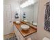 Double vanity bathroom with a wood countertop at 611 Resinwood Rd, Moncks Corner, SC 29461