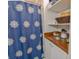 Bathroom with shower and built-in storage at 611 Resinwood Rd, Moncks Corner, SC 29461