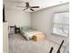 Bright bedroom featuring a comfy bed, window, and ceiling fan at 611 Resinwood Rd, Moncks Corner, SC 29461