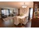 Bright dining area with hardwood floors and a large clock at 611 Resinwood Rd, Moncks Corner, SC 29461