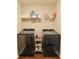Laundry room with washer, dryer, and shelving at 611 Resinwood Rd, Moncks Corner, SC 29461