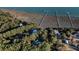 Property's waterfront location and lush surroundings at 6124 Rudder Ln, Awendaw, SC 29429