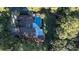 High-angle view of house, pool, and surrounding landscape at 6124 Rudder Ln, Awendaw, SC 29429