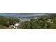 Aerial view of waterfront property with private docks at 6124 Rudder Ln, Awendaw, SC 29429