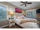 Bedroom with king bed, two night stands and large artwork at 6124 Rudder Ln, Awendaw, SC 29429