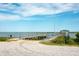 Wooden boat dock with gazebo offering scenic water views at 6124 Rudder Ln, Awendaw, SC 29429