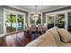 Breakfast nook with sliding glass doors leading to a pool and patio at 6124 Rudder Ln, Awendaw, SC 29429