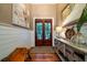 Bright and airy entryway with hardwood floors and nautical decor at 6124 Rudder Ln, Awendaw, SC 29429