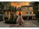 Stunning two-story home with a large driveway and landscaped yard at 6124 Rudder Ln, Awendaw, SC 29429