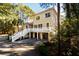 Two-story home with double garage and a spacious driveway at 6124 Rudder Ln, Awendaw, SC 29429