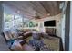 Comfortable outdoor living space with sectional sofa and TV at 6124 Rudder Ln, Awendaw, SC 29429