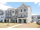 Modern townhome community featuring gray siding and landscaping at 801 Recess Pointe Dr # 55, Moncks Corner, SC 29461