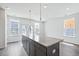Open concept kitchen with large island and granite countertops at 801 Recess Pointe Dr # 55, Moncks Corner, SC 29461
