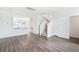 Bright living room with hardwood floors and stairs to upper level at 801 Recess Pointe Dr # 55, Moncks Corner, SC 29461