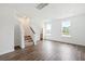 Spacious living room with hardwood floors and a half bathroom at 801 Recess Pointe Dr # 55, Moncks Corner, SC 29461