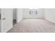 Spacious bedroom with carpeting and large window at 803 Recess Pointe Dr # 54, Moncks Corner, SC 29461