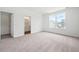 Large bedroom with plush carpeting and en-suite bathroom at 803 Recess Pointe Dr # 54, Moncks Corner, SC 29461