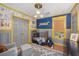 bedroom with Star Wars theme, gray and yellow color scheme at 8517 Falling Leaf Ln, North Charleston, SC 29420