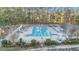 Resort-style community pool with plenty of lounge chairs at 8517 Falling Leaf Ln, North Charleston, SC 29420