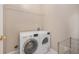 Laundry room with washer, dryer, and additional shelving at 8517 Falling Leaf Ln, North Charleston, SC 29420