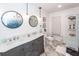 Bright bathroom with double vanity and white shiplap walls at 1081 Saint Thomas Island Dr, Charleston, SC 29492
