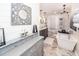 Spa-like bathroom featuring a freestanding tub and gray toned vanity at 1081 Saint Thomas Island Dr, Charleston, SC 29492