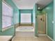Relaxing bathroom with a garden tub and a separate shower at 173 Hainsworth Dr, North Charleston, SC 29418