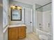 Simple bathroom with single sink vanity, bathtub and shower at 173 Hainsworth Dr, North Charleston, SC 29418